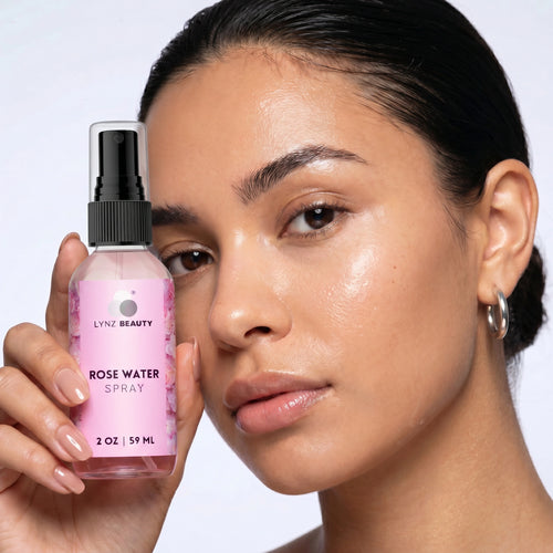 Model misting LYNZ Beauty Rose Water Facial Mist Spray for a dewy refreshed glow – sensitive skin toner